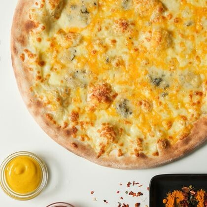 Пицца «Четыре сыра»