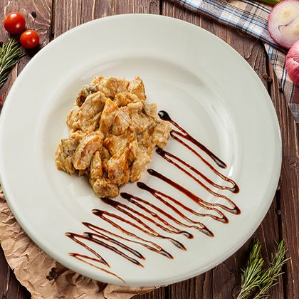 Боровики жареные с луком и сметаной