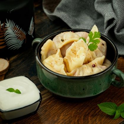 Вареники с картофелем и грибами и сл. маслом