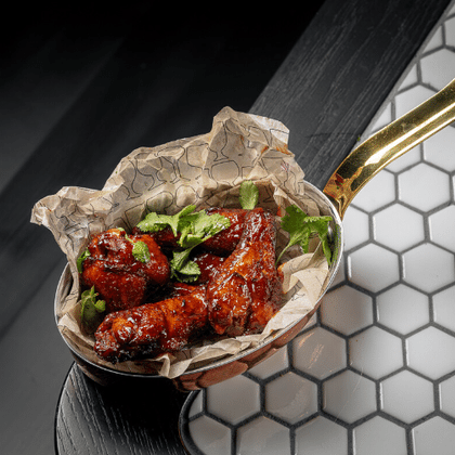 Куриные крылья в соусом BBQ