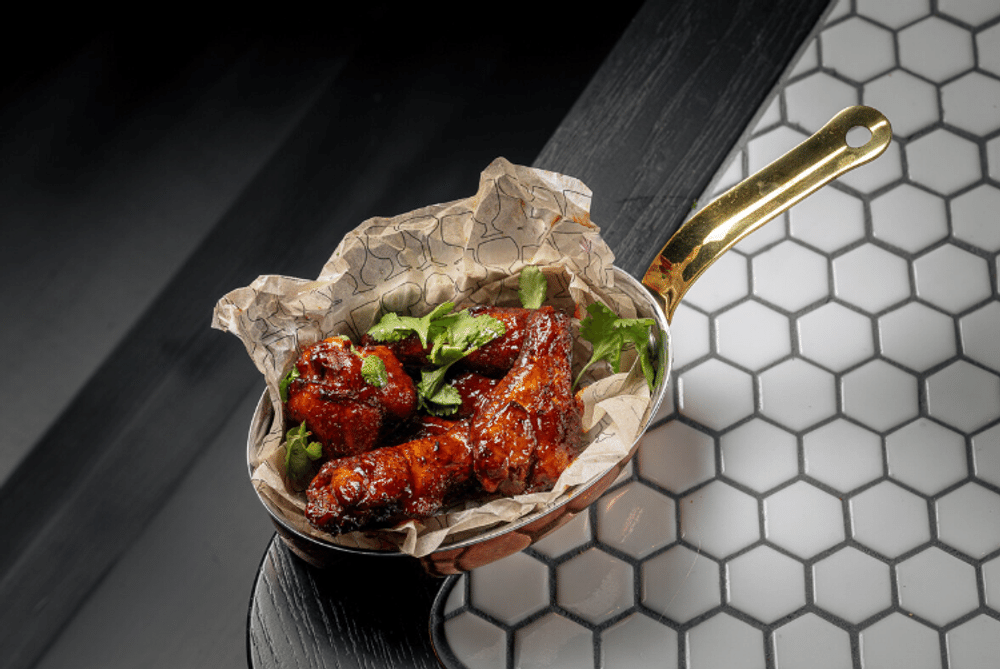 Куриные крылья в соусом BBQ