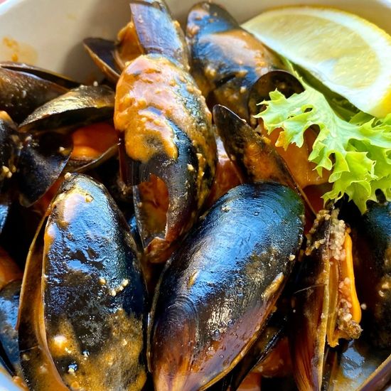 Мидии в пряном соусе том-ям